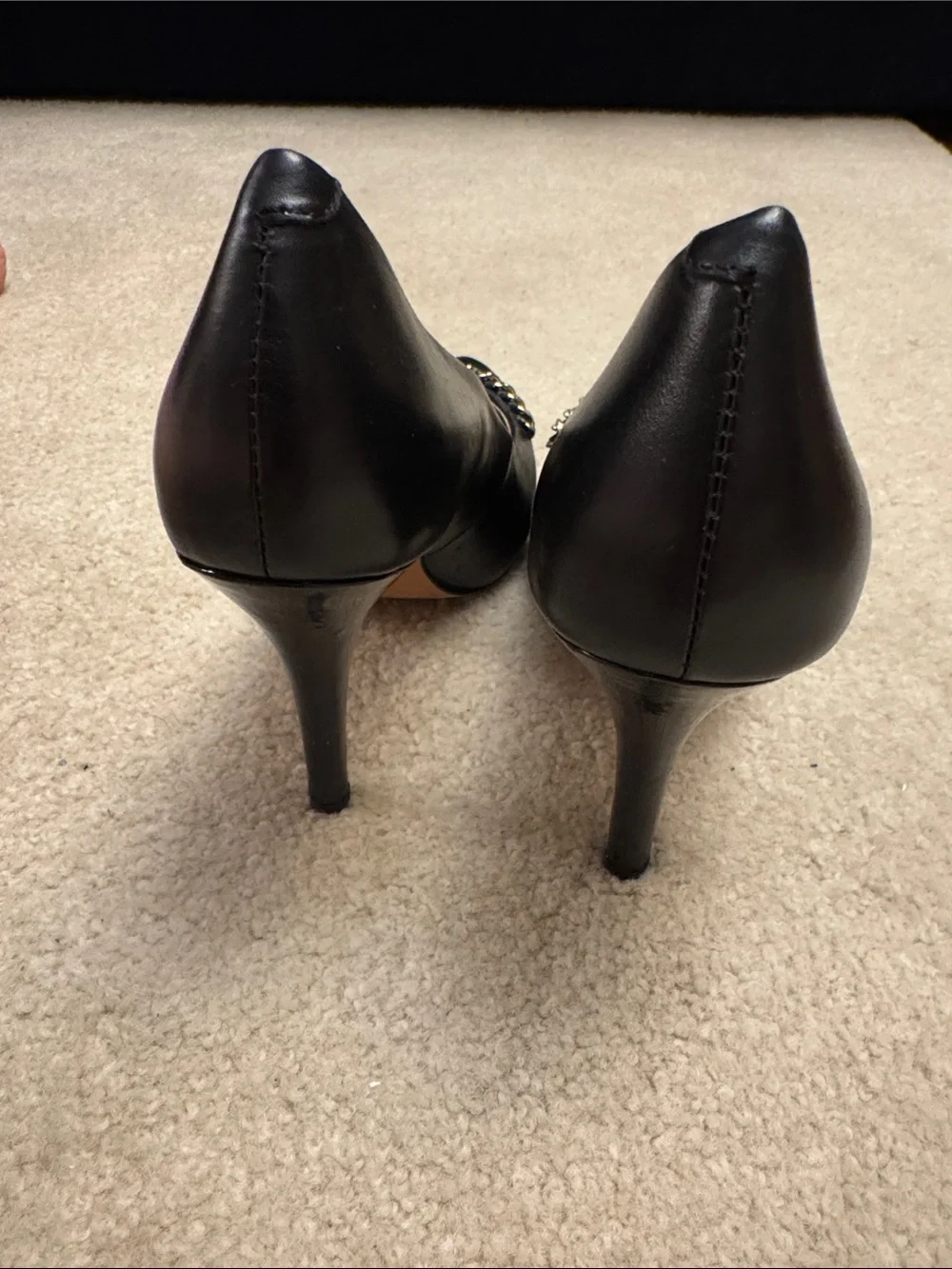 Isola Black Leather Pointed-Toe Pumps with Chain Trim